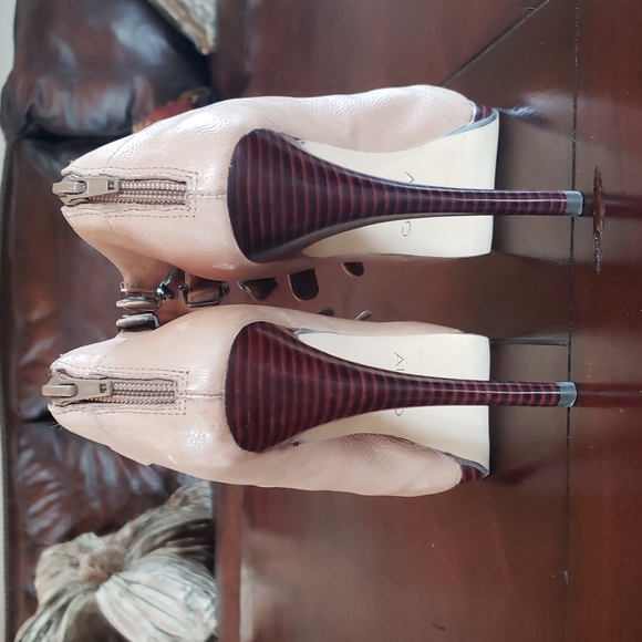 Platform tan booties with 6 buckle straps & a fun pop of orange under toes! - Picture 6 of 7